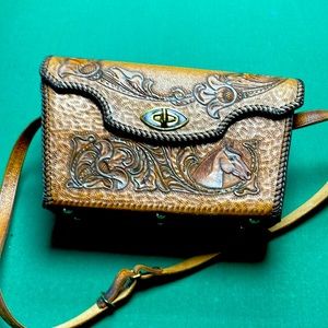 Hand Tooled Fine Leather Horse purse with tiger eye thumb latch.